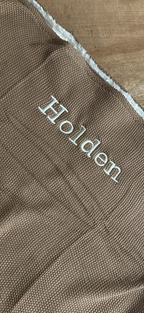 Gepersonaliseerd gebreid babydekentje – Bruin